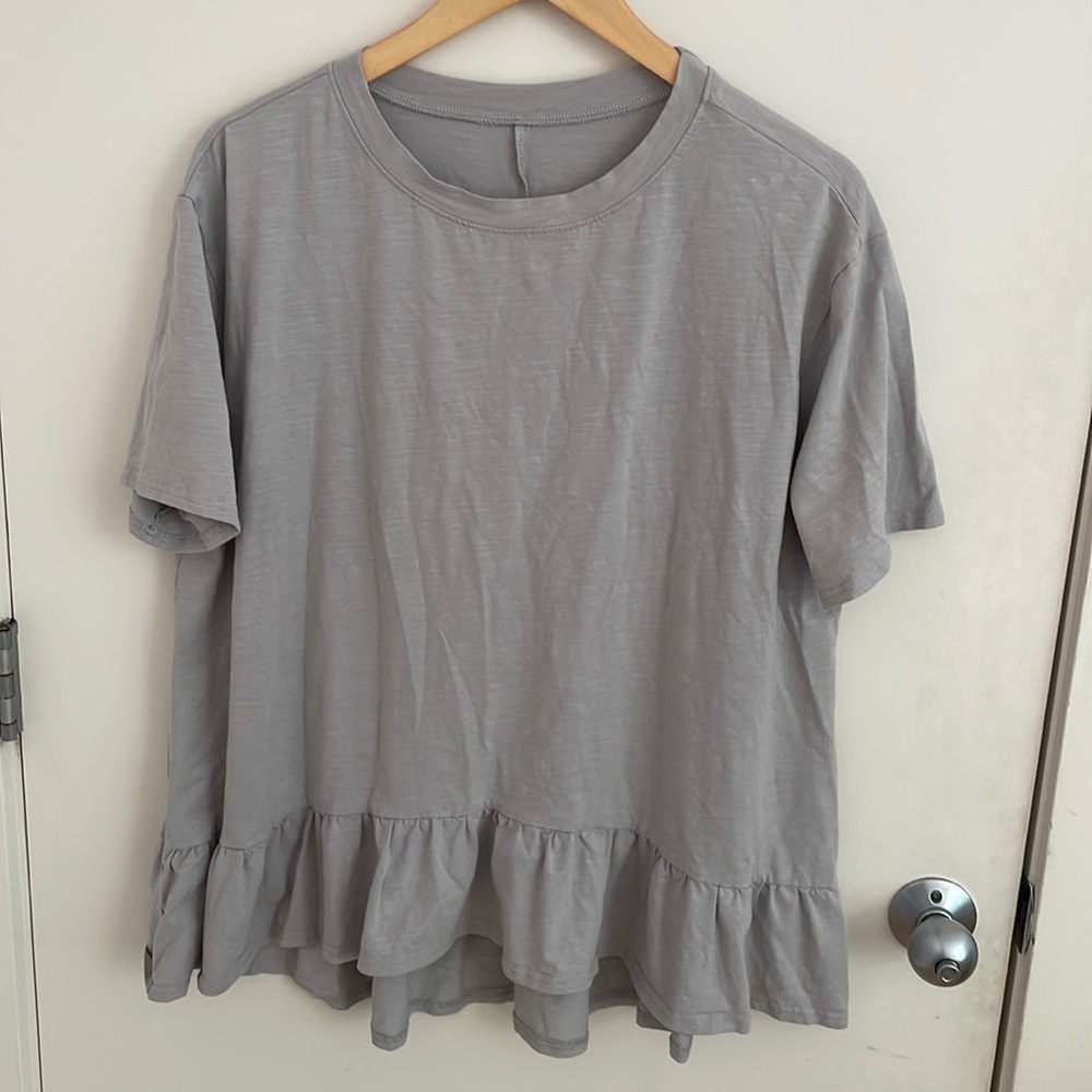 Grey ruffle hem top